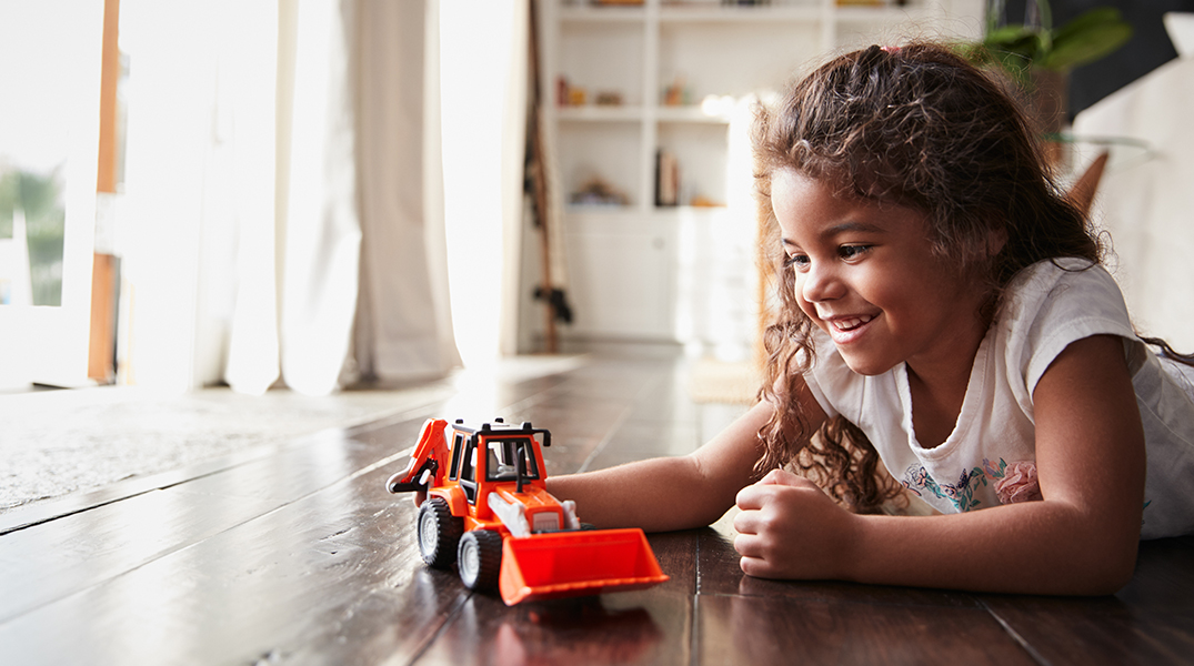 Young girl with toy