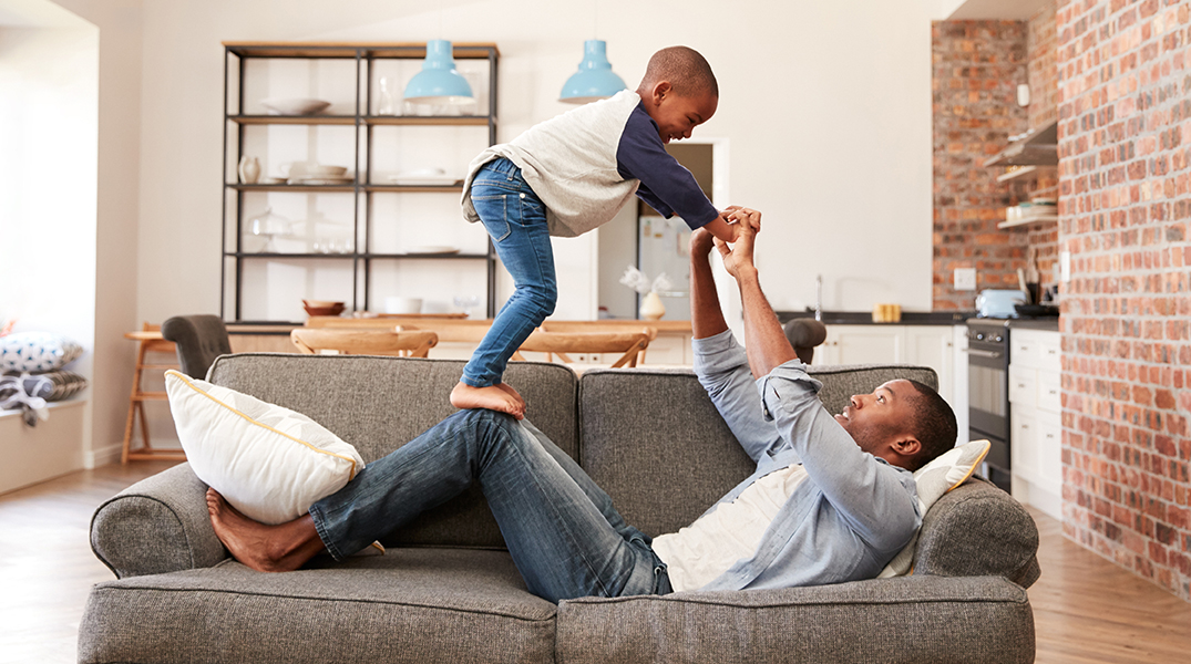 Father and son playing