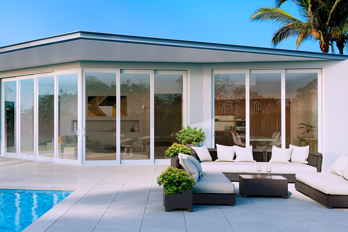 Beautiful poolside furniture with hurricane impact windows