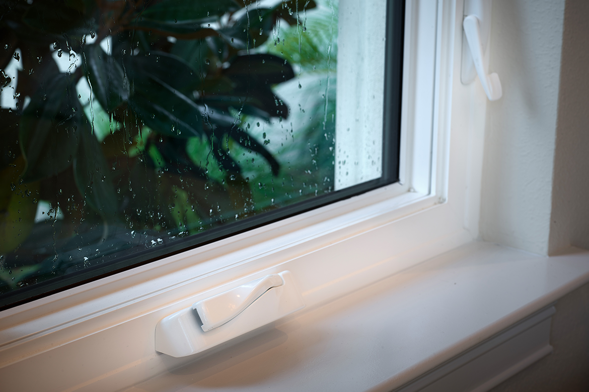 Hurricane impact-resistant window providing shelter from a tropical storm