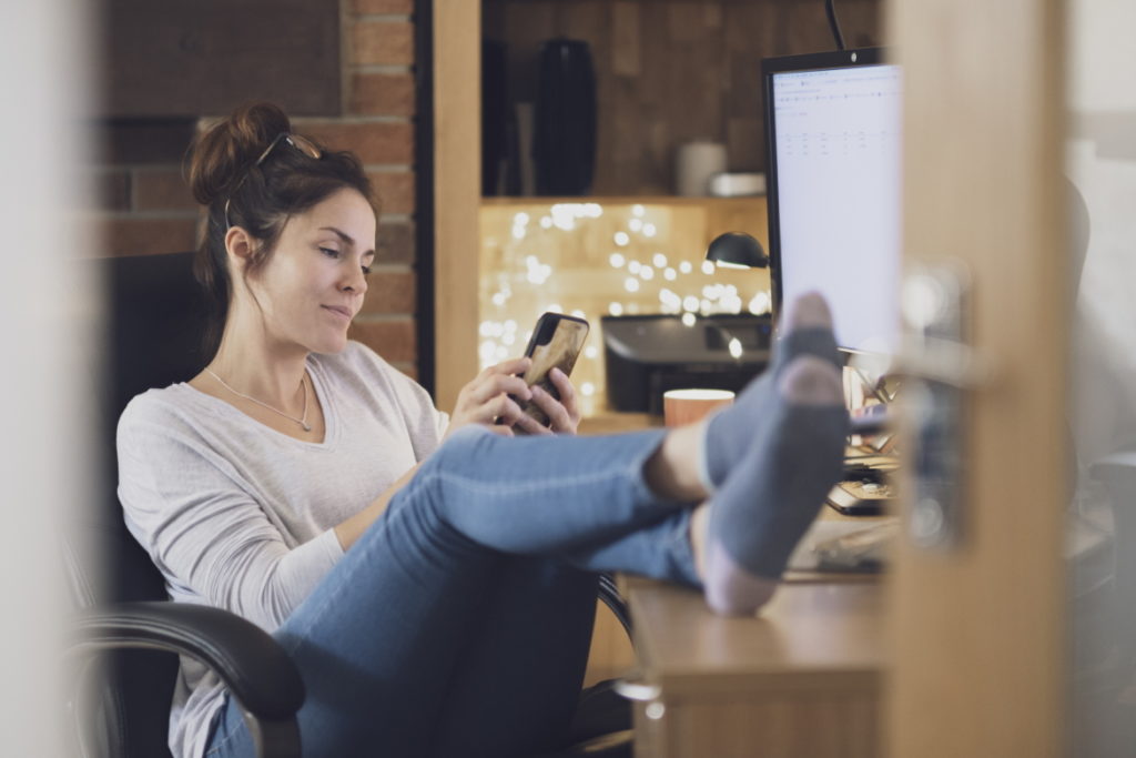 Woman enjoys quiet comfort in her home office